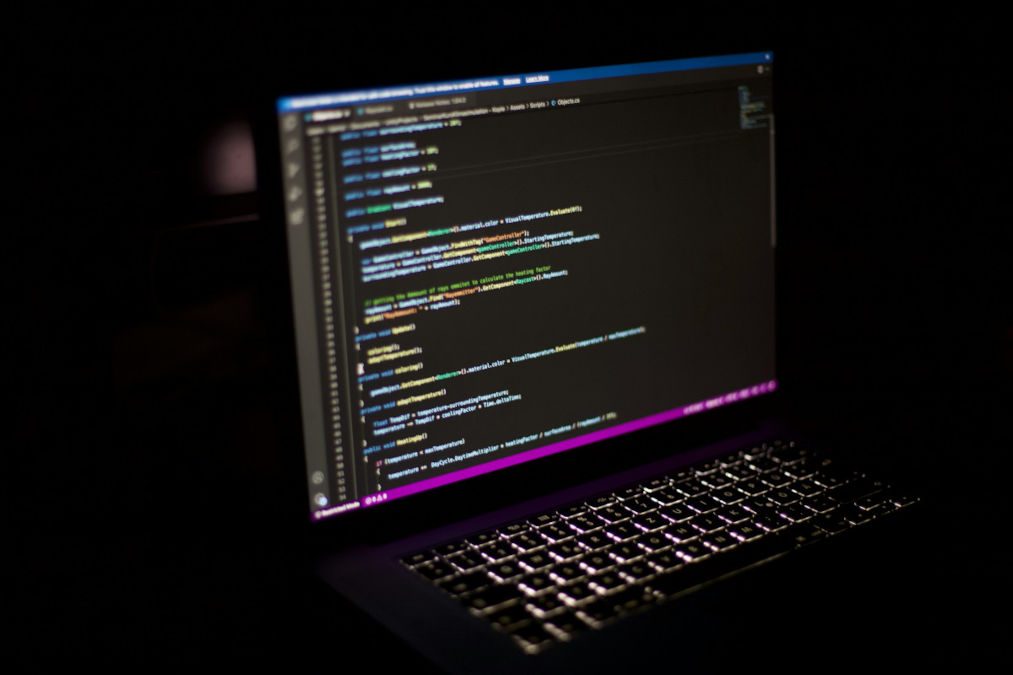 Laptop on desk representing web development work